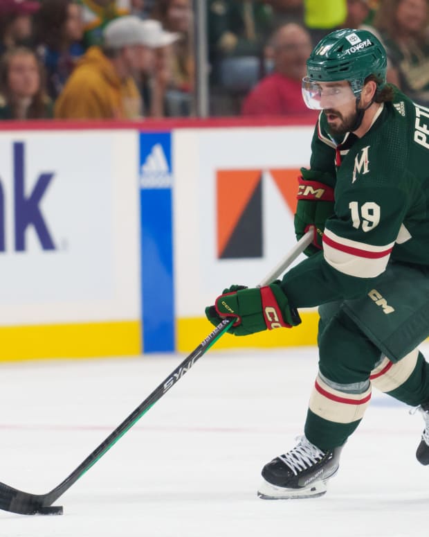 Sep 28, 2023; Saint Paul, Minnesota, USA; Minnesota Wild center Nic Petan (19) skates with the puck against the Colorado Avalanche in the second period at Xcel Energy Center.